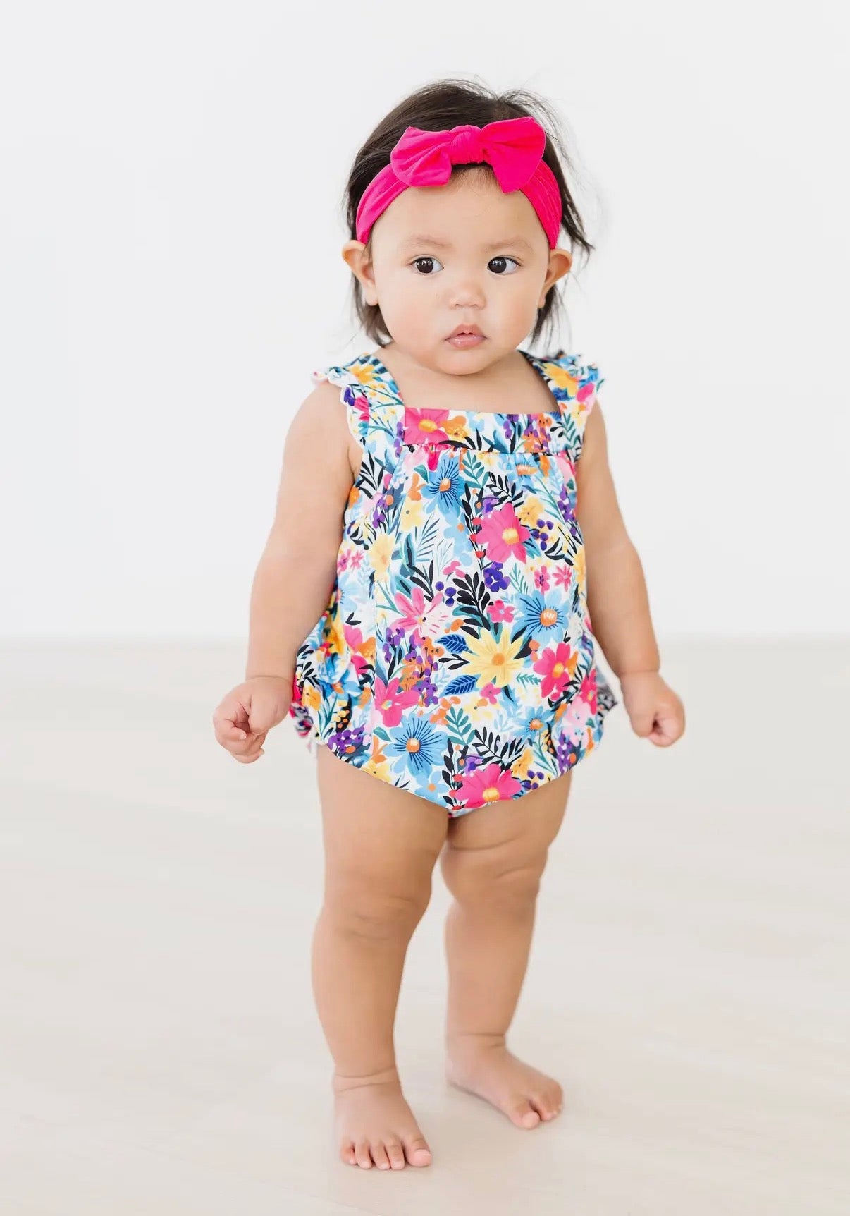 Petal Paradise Ruffle Cross Back Romper